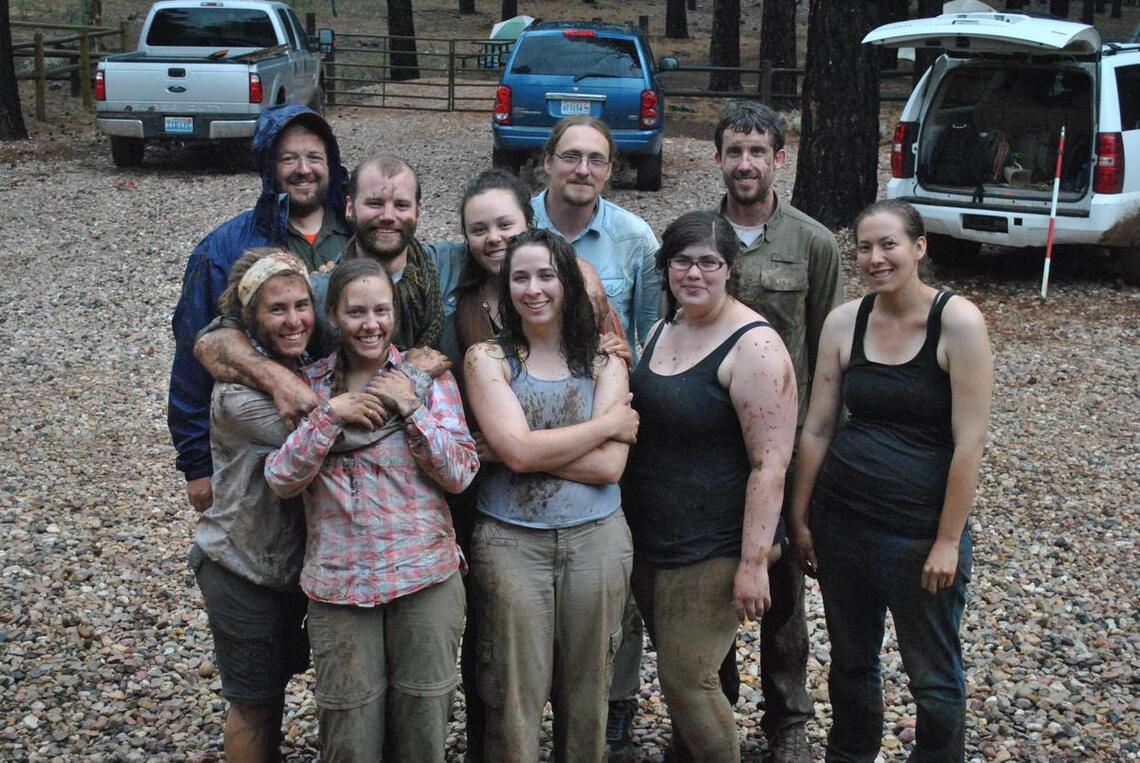 A group of people smiling