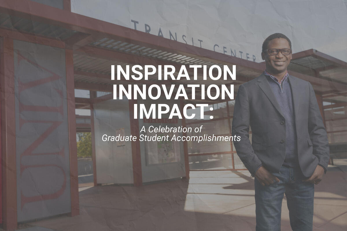 A man in a suit standing in front of the UNLV Transit Center