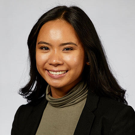 A woman smiling.