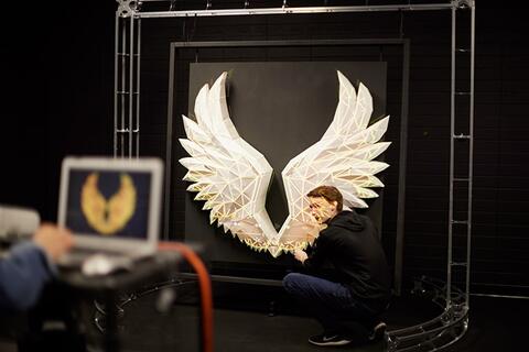 Student working on an art projection
