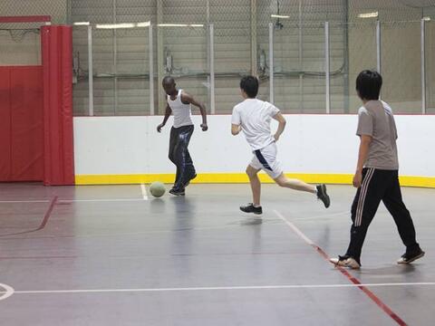 Indoor Soccer Students playing indoor soccer at an court in the SRWC.